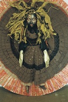 brown wax doll with blonde highlights