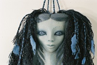 blue haired wax doll detail